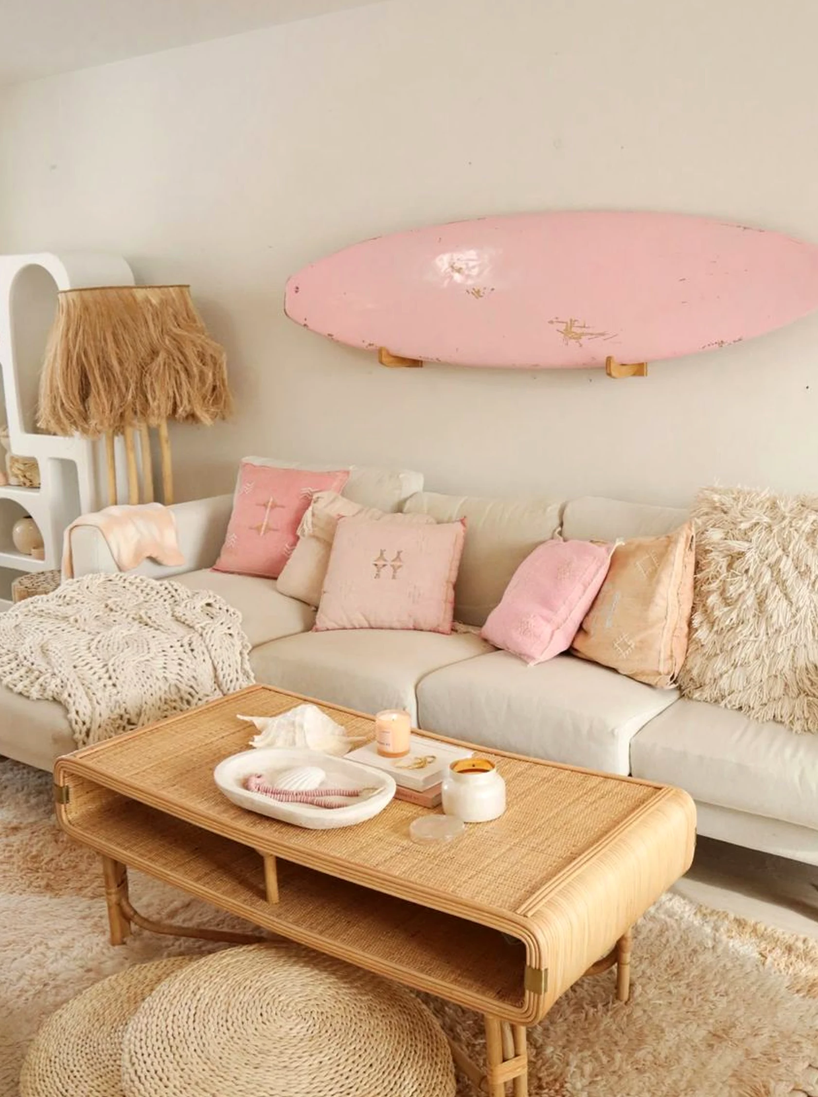 Simple breakfast table brings a useful note of contrast, making the garden edge feel ready for quiet use.