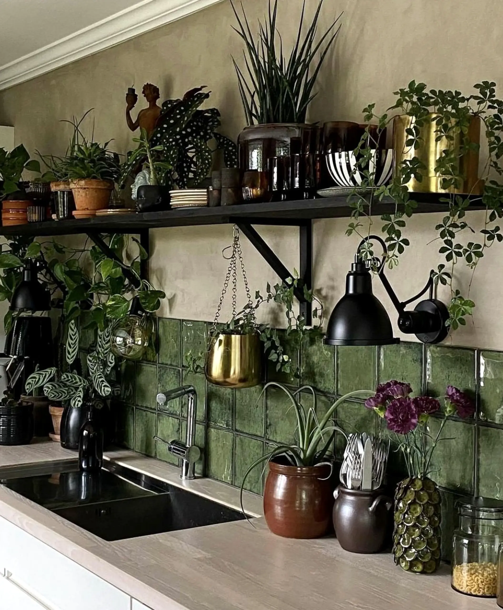 Cozy wood shelving supports the arrangement through contrast, leaving the space feeling open and lived-in.