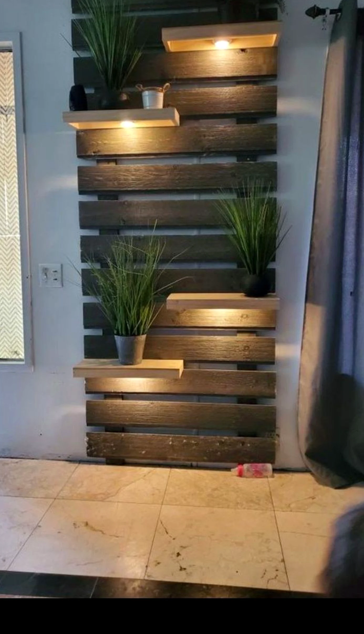 Compact kitchen nook draws attention to contrast while the outdoor space stays settled and welcoming.