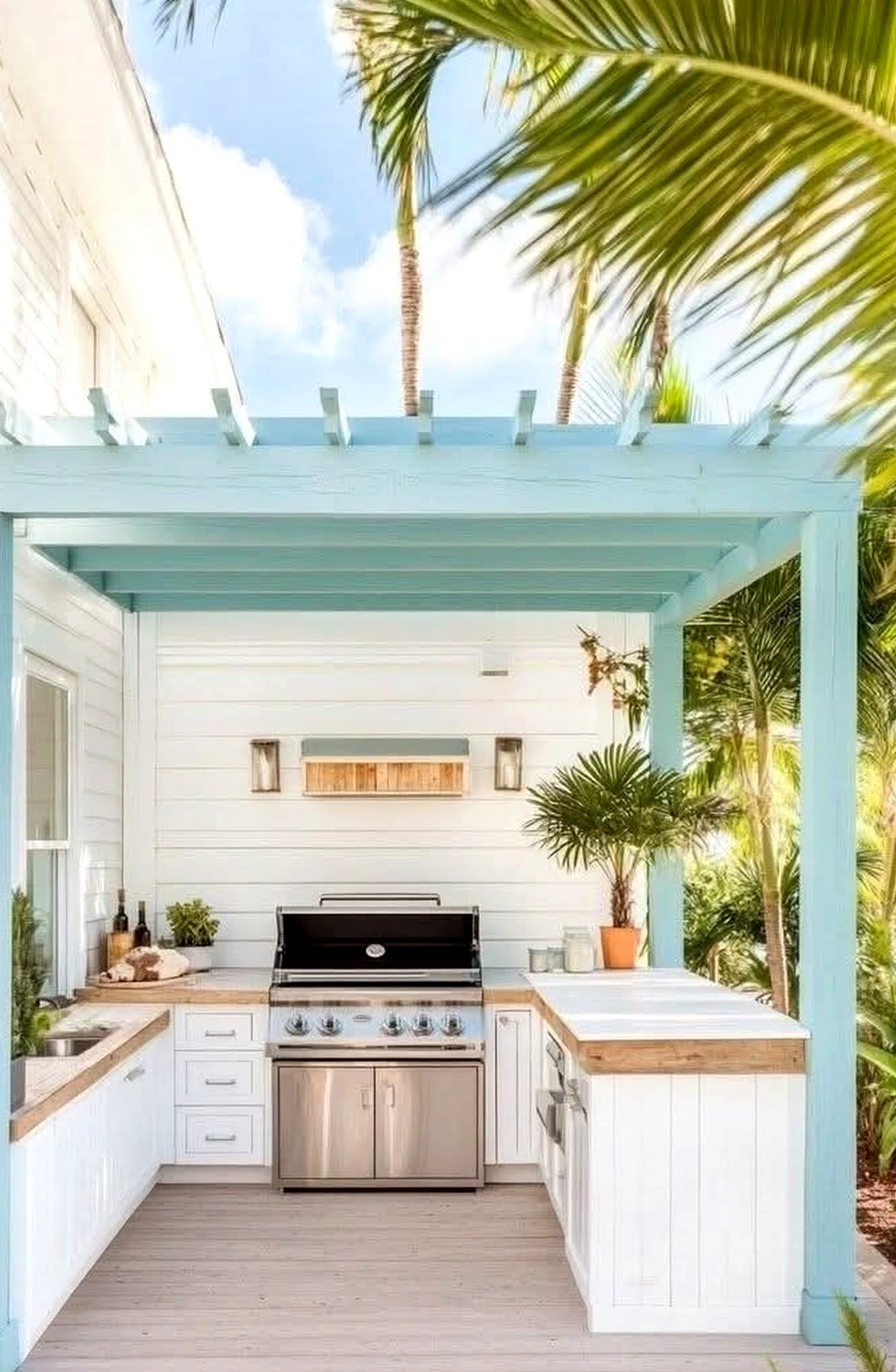 Warm terrace table anchors the outdoor space with detail, giving the view a mood that feels warm without clutter.