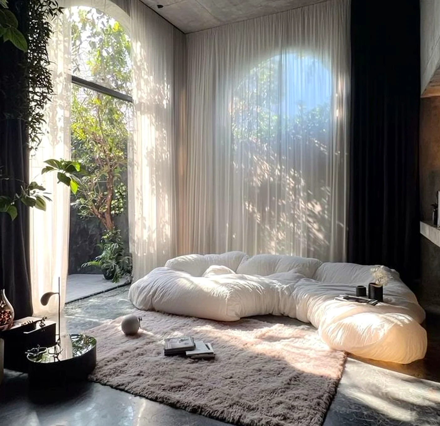 Calm courtyard view introduces balance into the corner, keeping the atmosphere simple yet expressive.