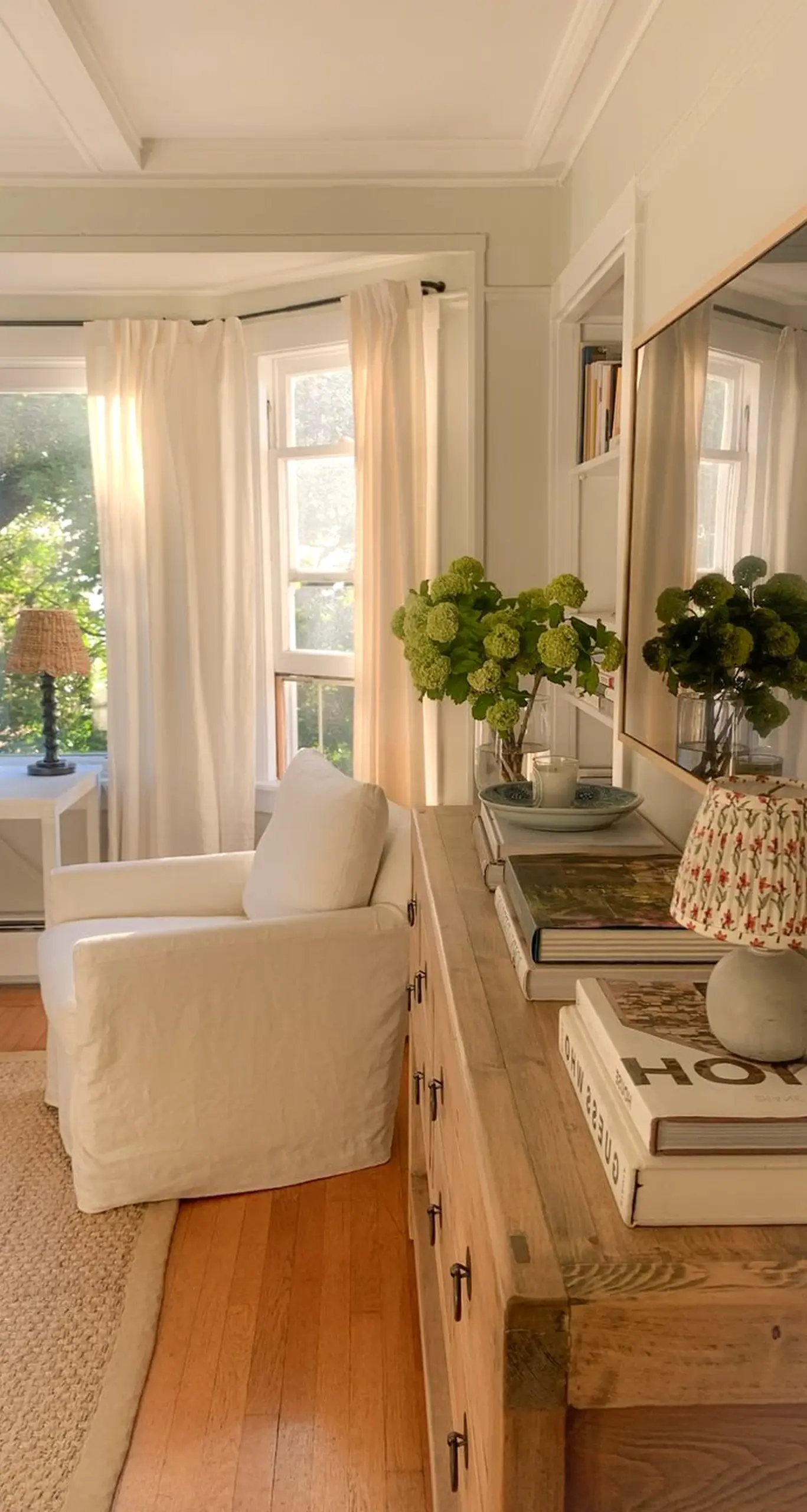 Earthy garden border frames the view with softness, making the scene feel settled and welcoming.