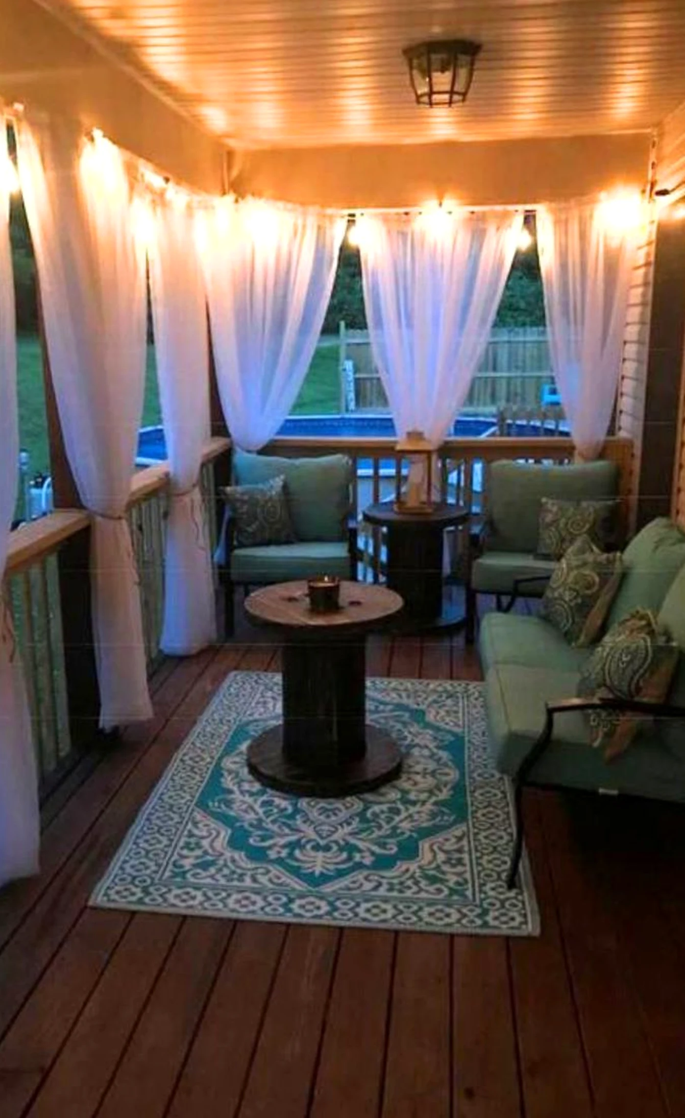 Luminous painted door draws attention to softness while the garden edge stays bright but not busy.