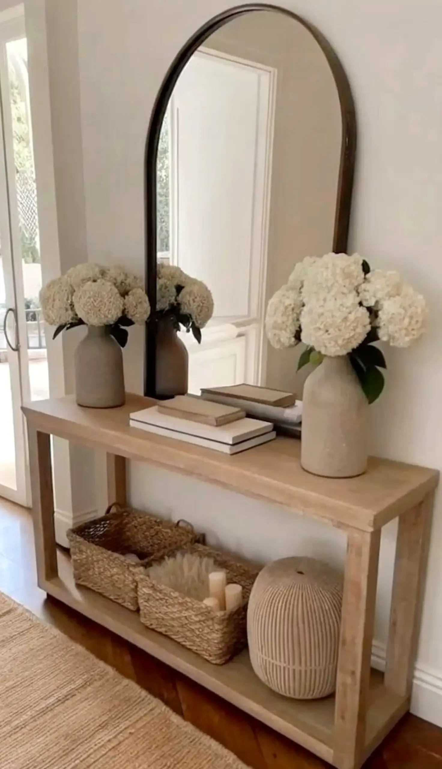 Soft neutral bedroom adds personality across the entry, giving the decor a finish that feels quietly finished.