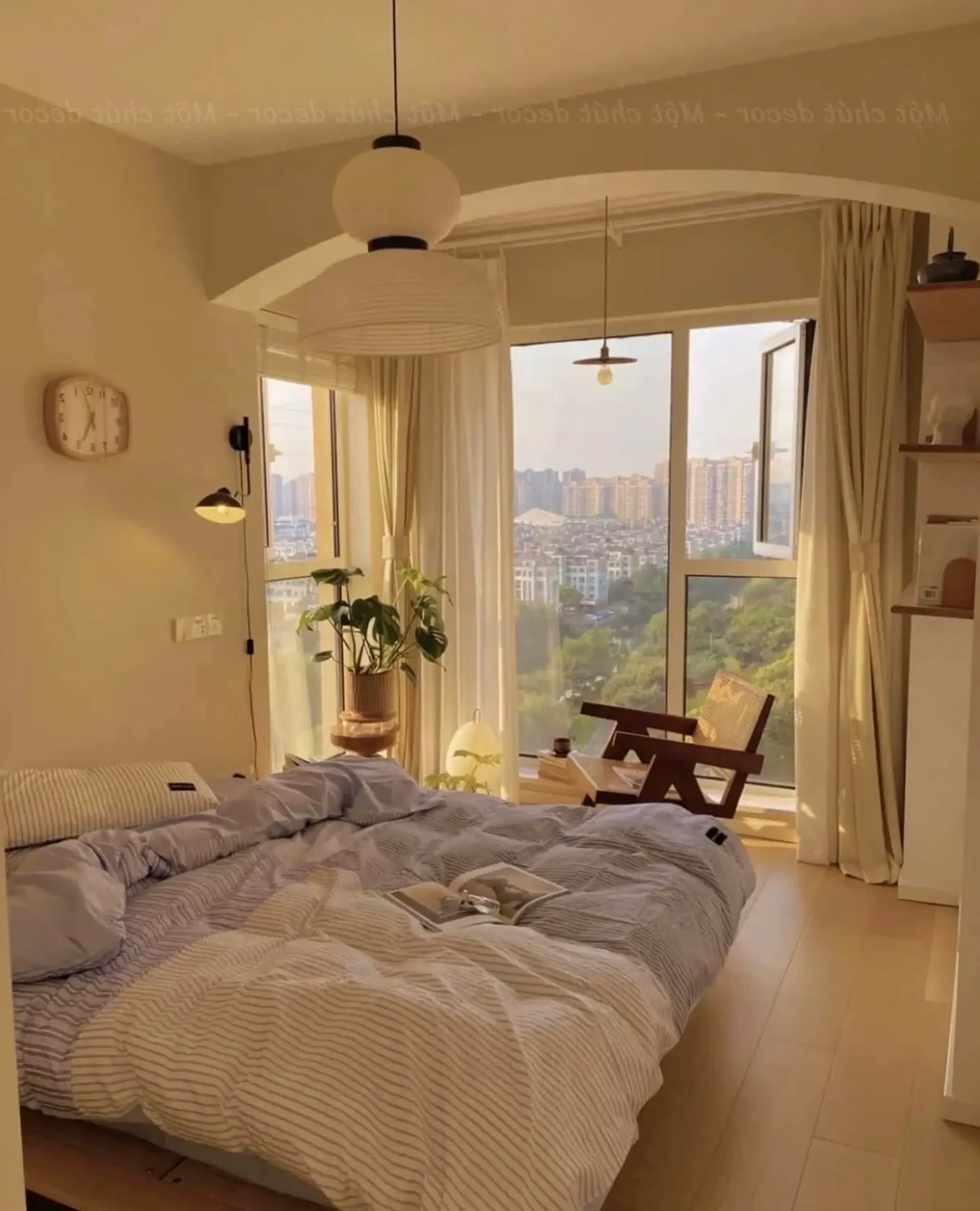 Leafy balcony scene anchors the sitting area with depth, giving the view a mood that feels clear and inviting.