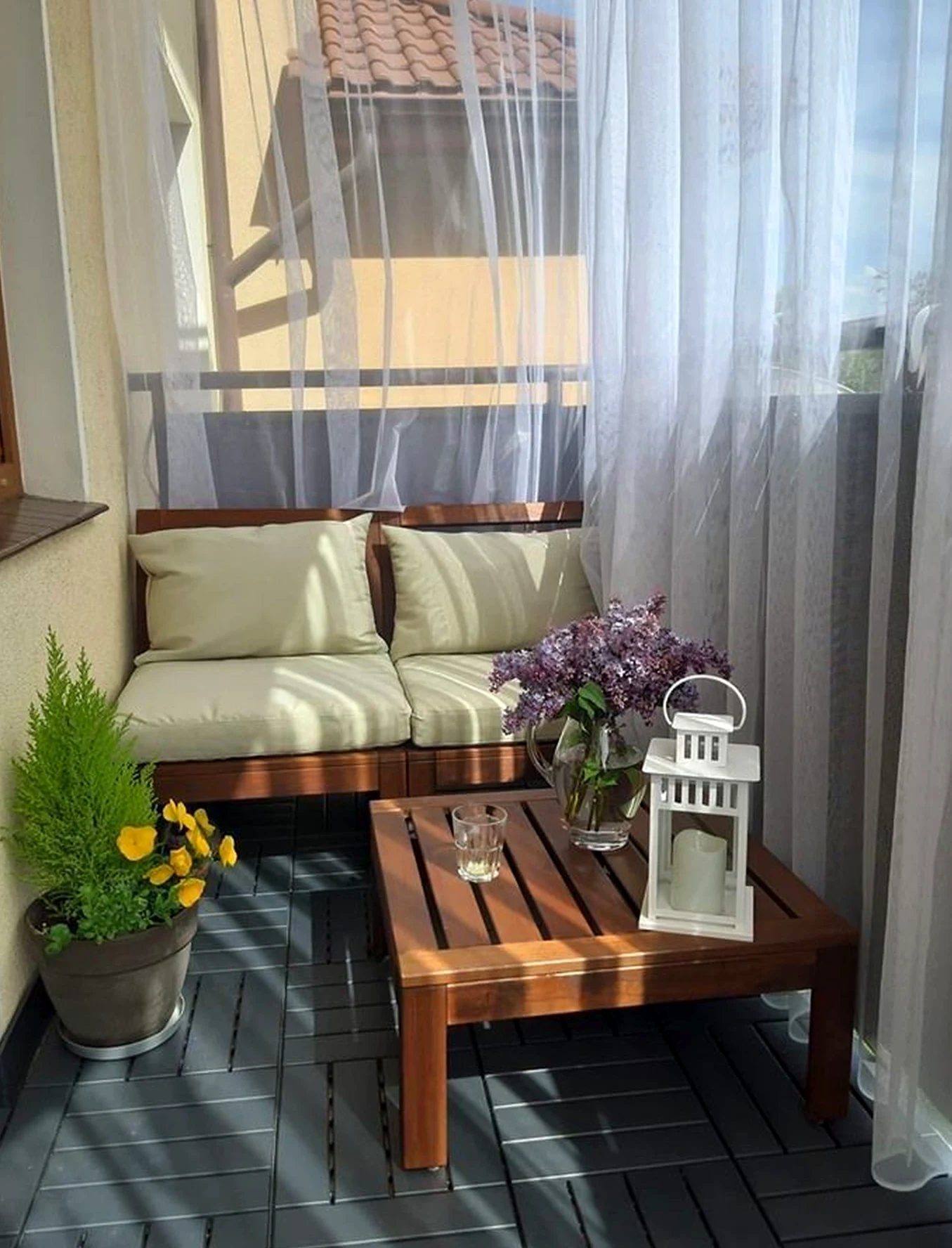 Soft flower arrangement brings personality to the room, creating a mood that feels soft at the edges.