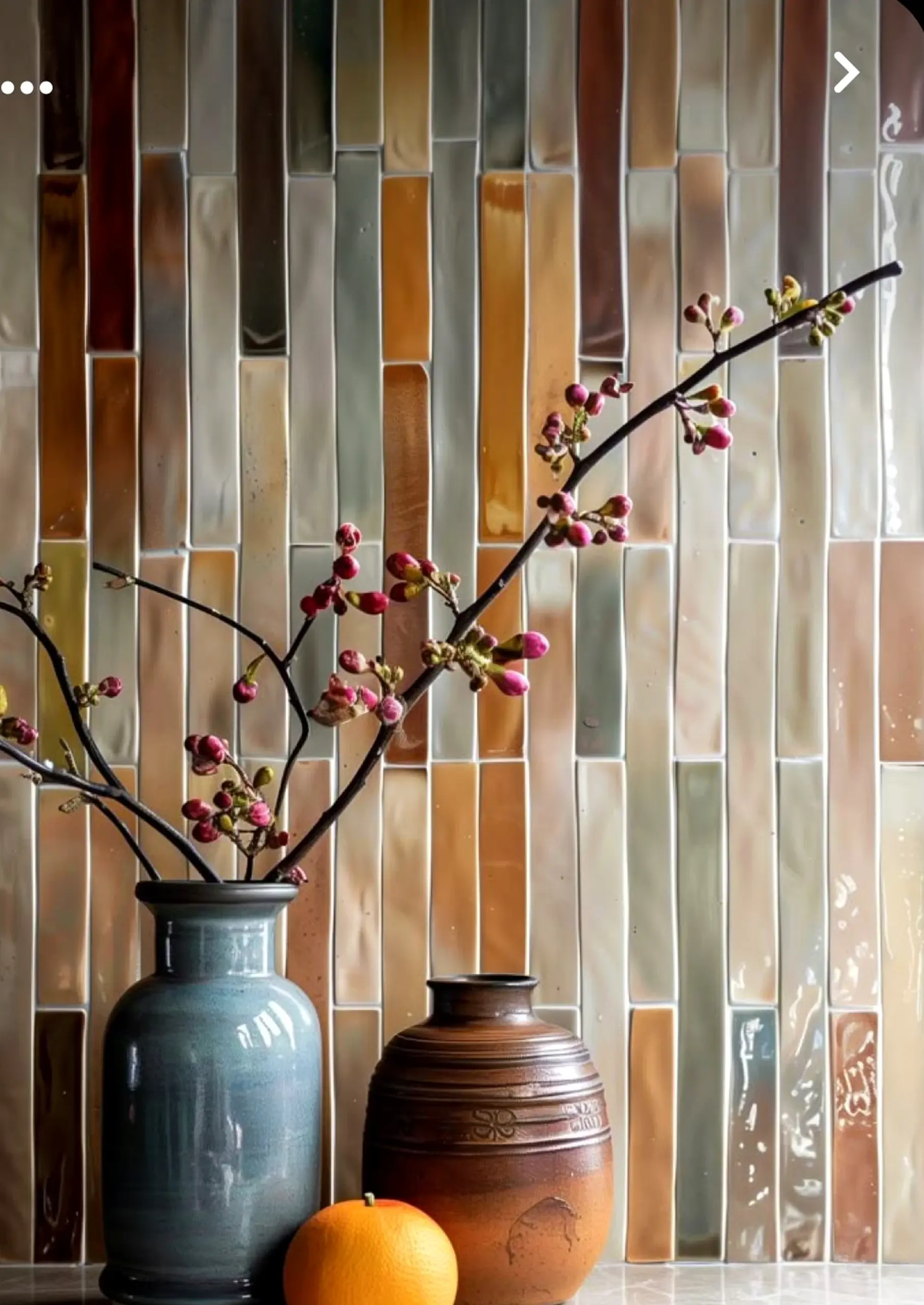 Relaxed cabinet wall introduces movement into the setting, keeping the atmosphere quietly finished.