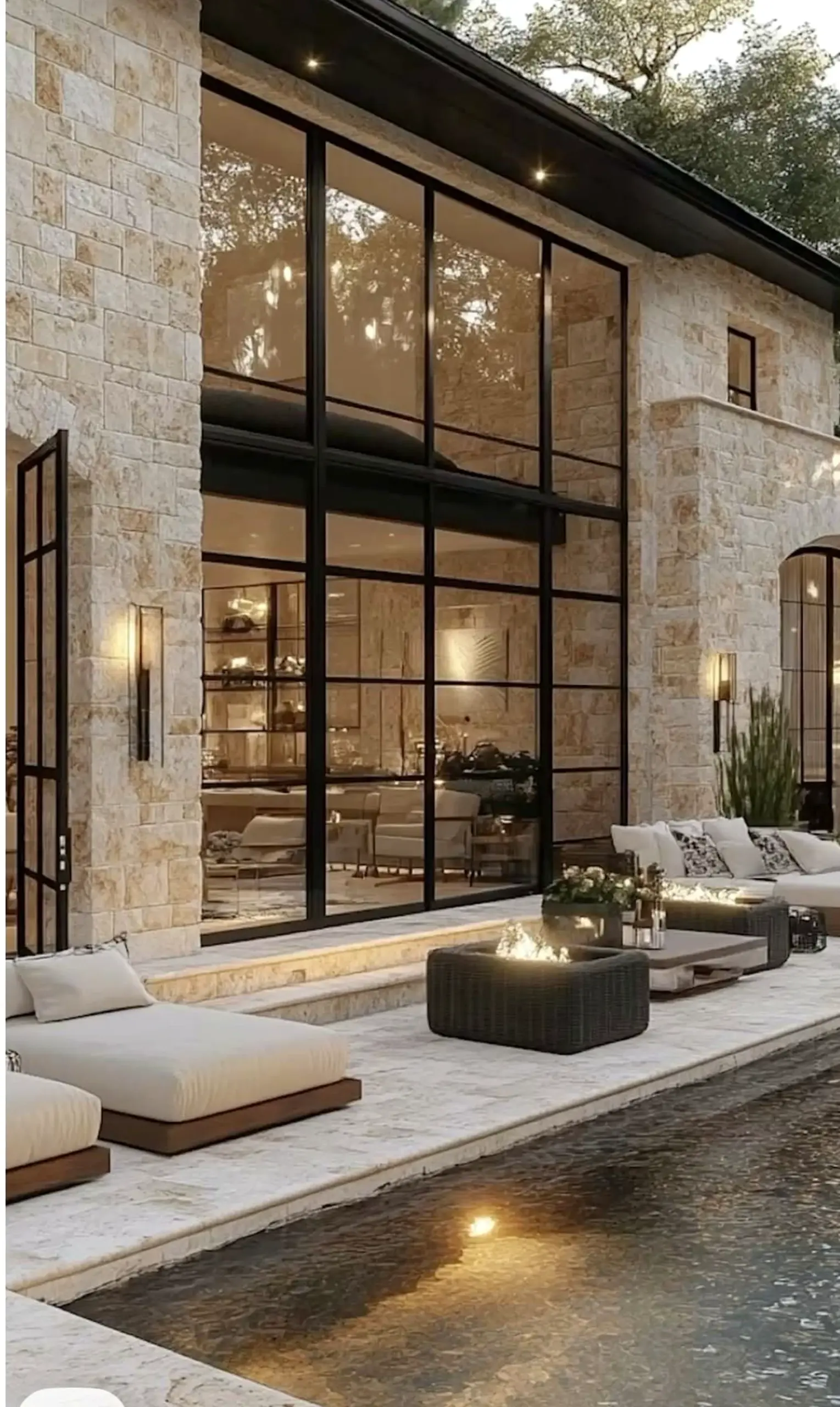 Layered garden seating gives the corner more warmth, so the whole view feels open and lived-in.