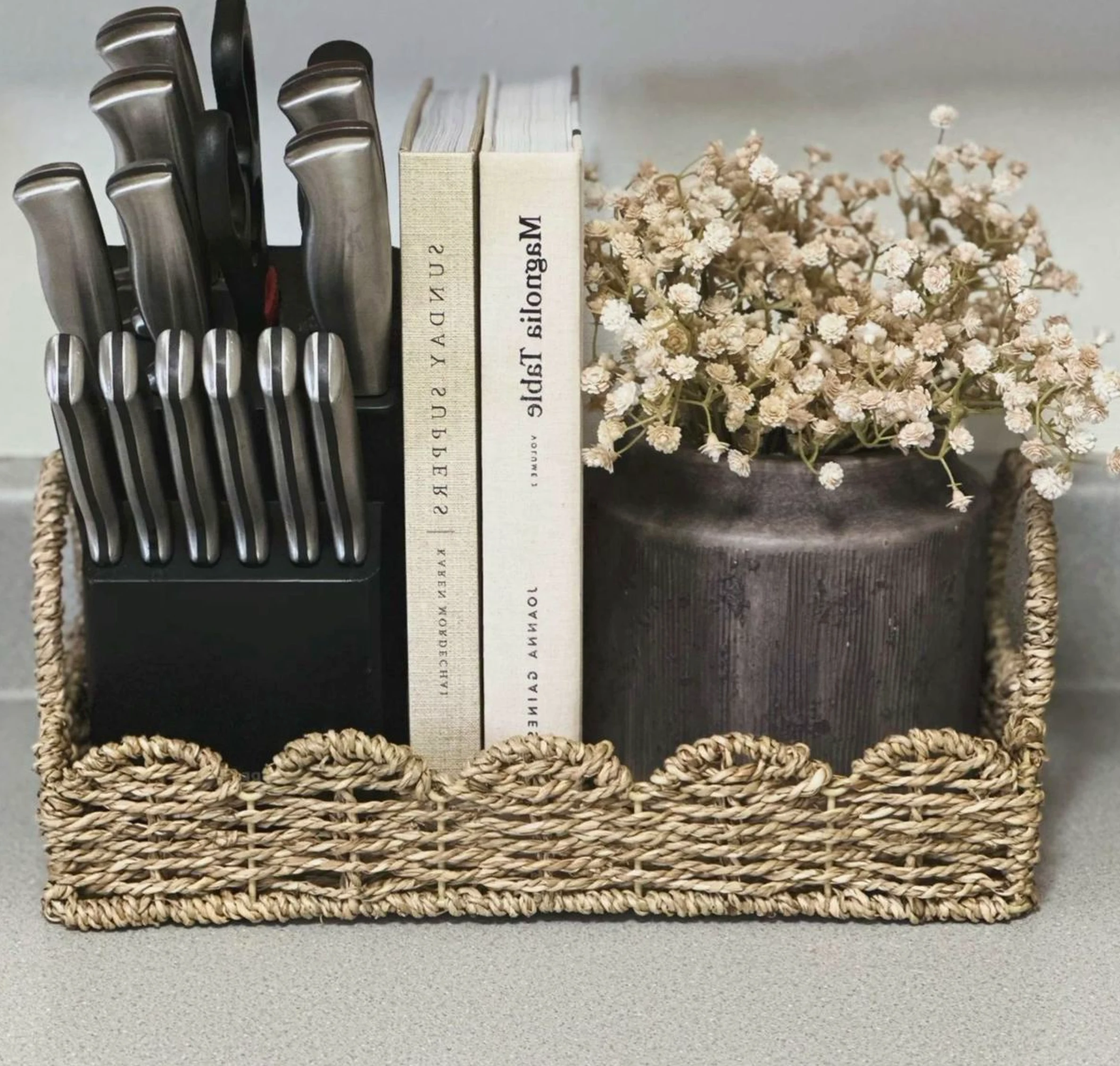 Polished cabinet wall frames the arrangement with character, making the scene feel warm without clutter.