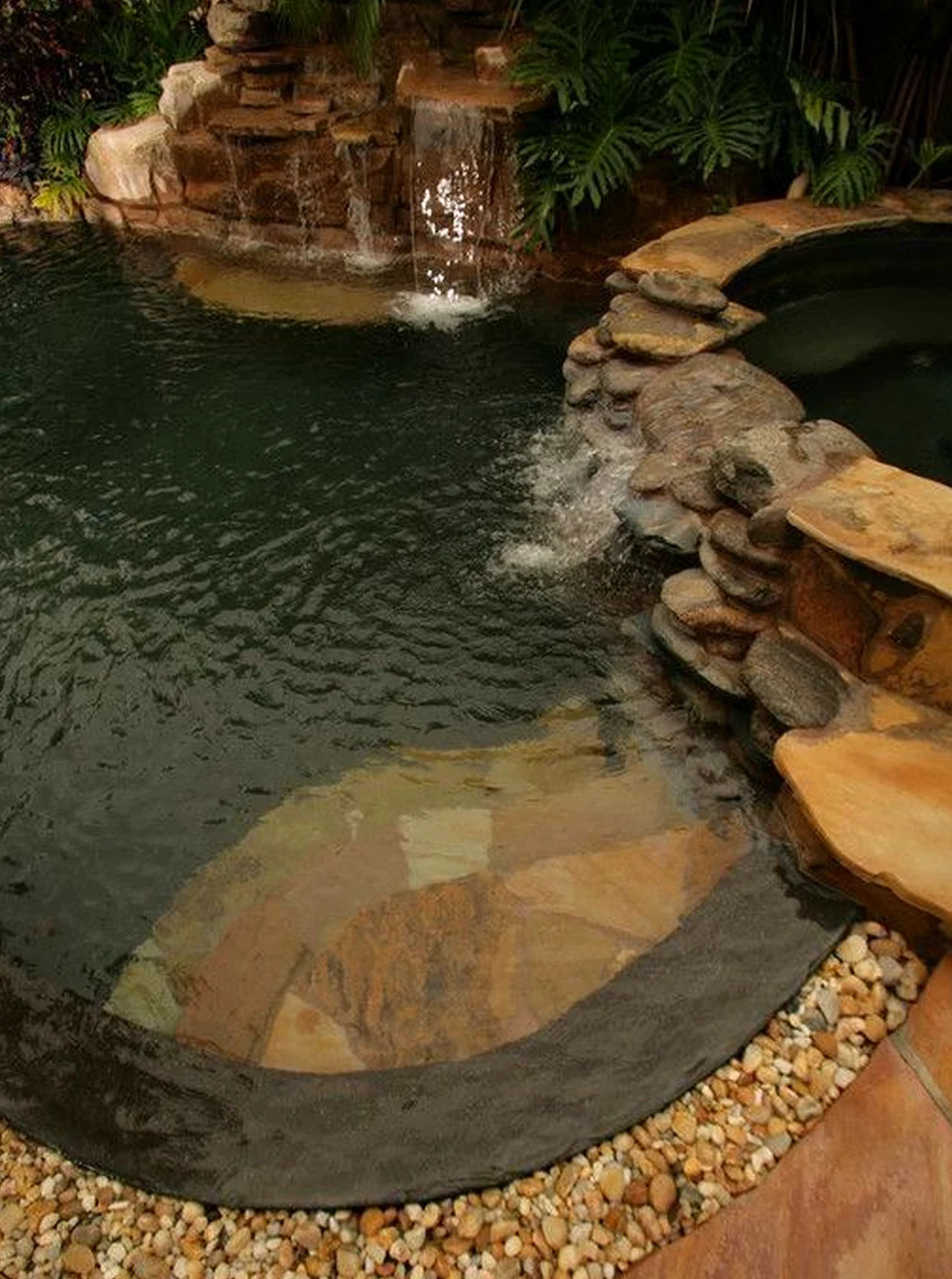 Colorful stone terrace adds focus across the design, giving the decor a finish that feels warm without clutter.